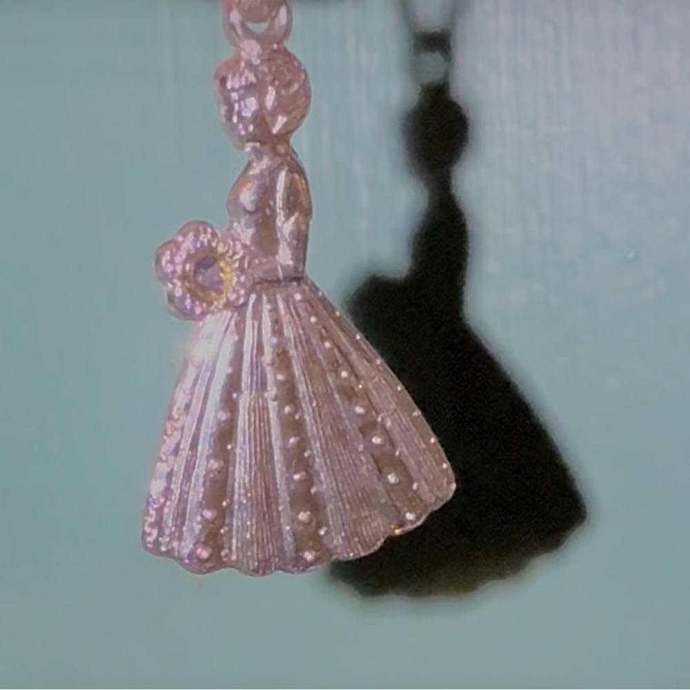 Vintage flower girl charm or pendant